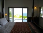 Master bedroom looking out to pool